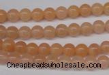 CPE02 15.5 inches 6mm round peach stone beads wholesale