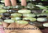 CRI116 15.5 inches 10*30mm faceted rice green garnet beads