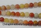 CRJ401 15.5 inches 6mm faceted round red & yellow jade beads