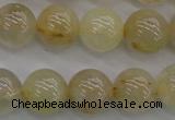 CRU583 15.5 inches 10mm round golden rutilated quartz beads