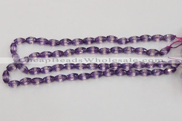 CSA25 15.5 inches 7*12mm faceted rice synthetic amethyst beads