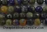 CSO751 15.5 inches 6mm faceted round orange sodalite beads