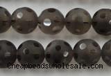 CSQ254 15.5 inches 14mm carved round matte smoky quartz beads