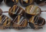 CTE1591 15.5 inches 12*16mm twisted rice yellow tiger eye beads