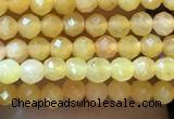 CTG1035 15.5 inches 2mm faceted round tiny yellow jade beads