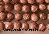 CTG3590 15.5 inches 4mm faceted round goldstone beads wholesale