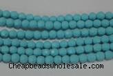 CTU1220 15.5 inches 4mm faceted round synthetic turquoise beads