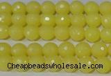 CTU2524 15.5 inches 6mm faceted round synthetic turquoise beads