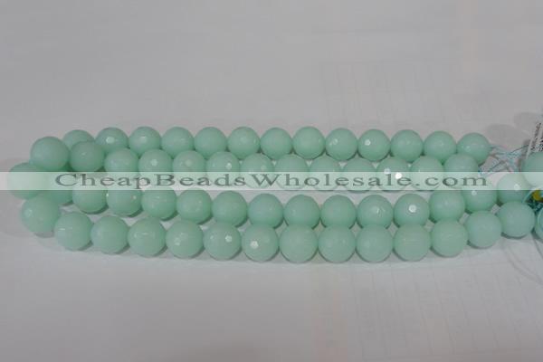 CTU2576 15.5 inches 14mm faceted round synthetic turquoise beads