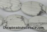 CWB68 15.5 inches 20*30mm carved oval natural white howlite beads