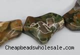 CWG08 15.5 inches 25*33mm wavy freeform rhyolite gemstone beads