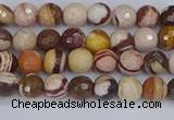 CZJ278 15.5 inches 4mm faceted round zebra jasper beads