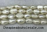 FWP304 15 inches 11mm - 12mm baroque white freshwater pearl strands